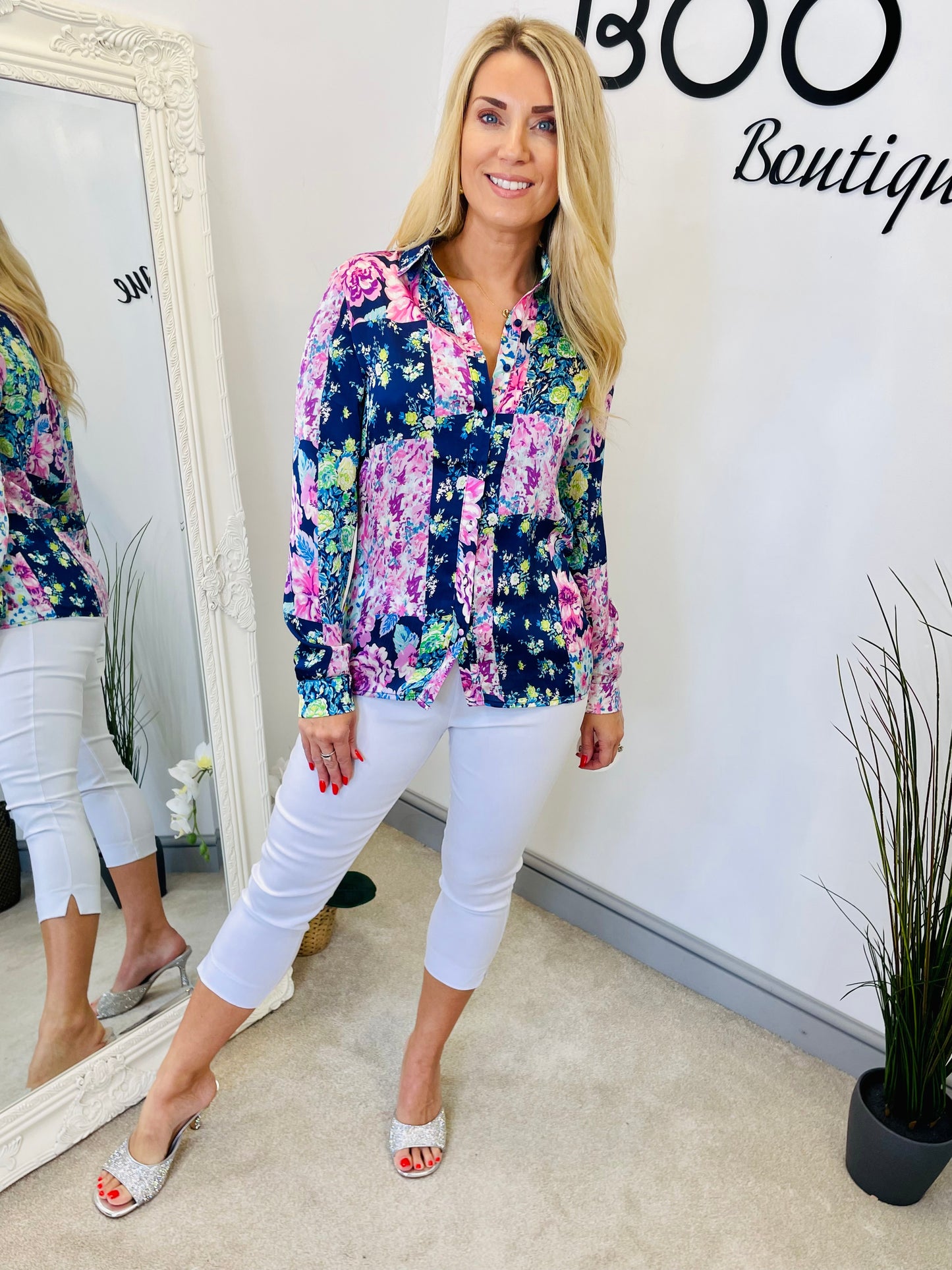 The CARLIE navy and pink floral print blouse