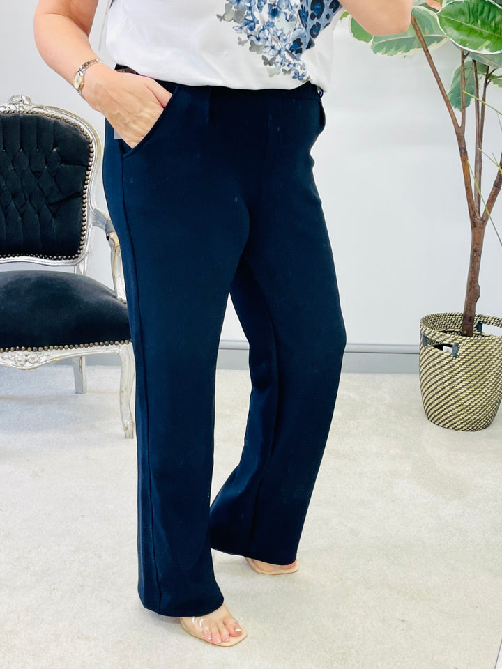 The MINDY navy wide leg trousers