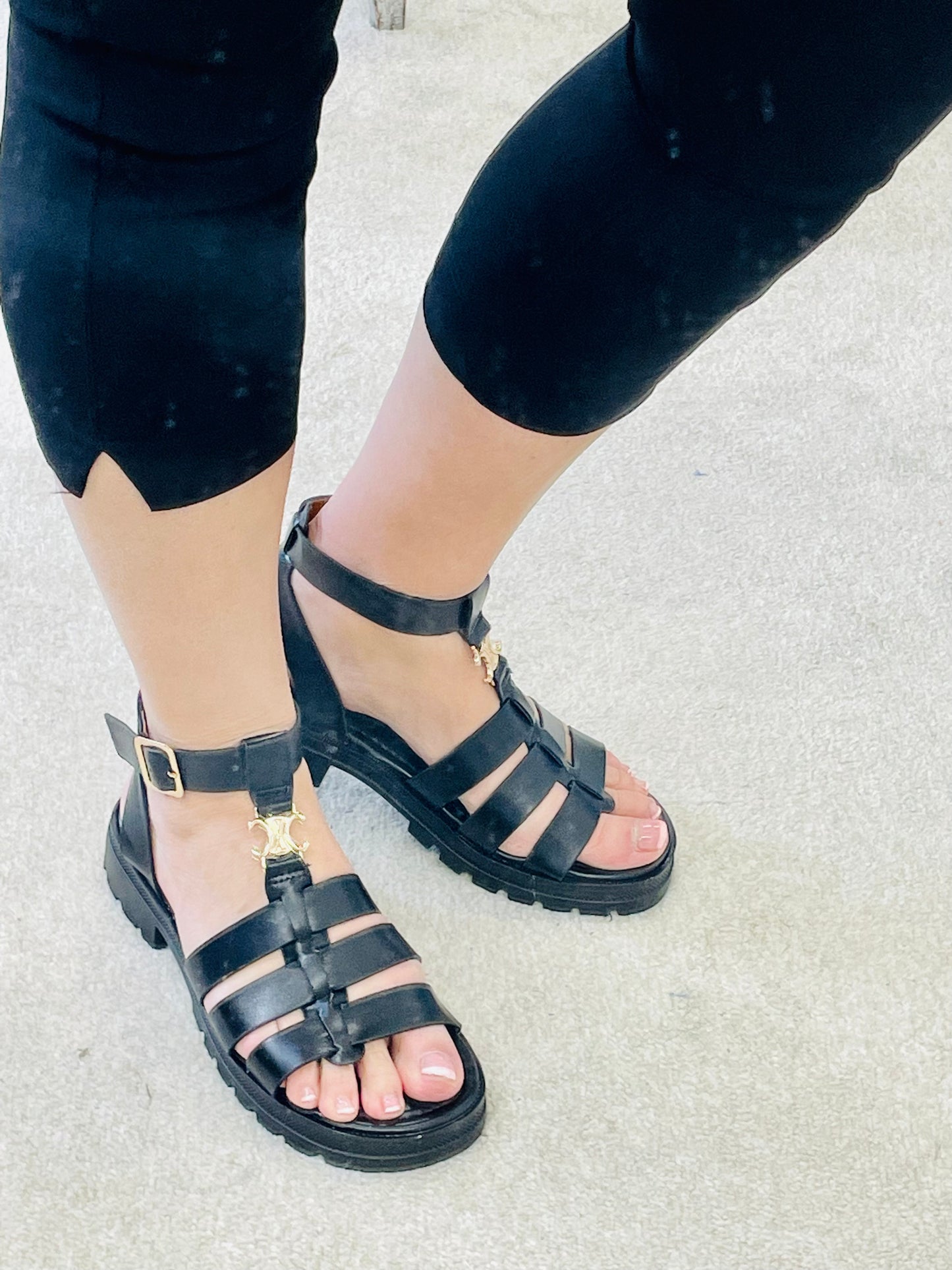 The ELENA strappy flat black sandals